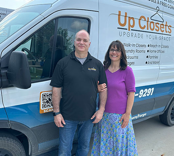 Mike and Gloria Jordahl with the Up Closets van